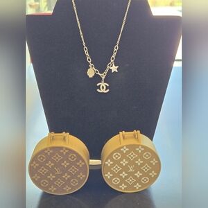 Elegant Silver Necklace with Charms